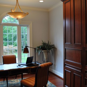 Cleveland Interior Design - Cherry wood Floor and cabinets, area rug, accent and task lighting